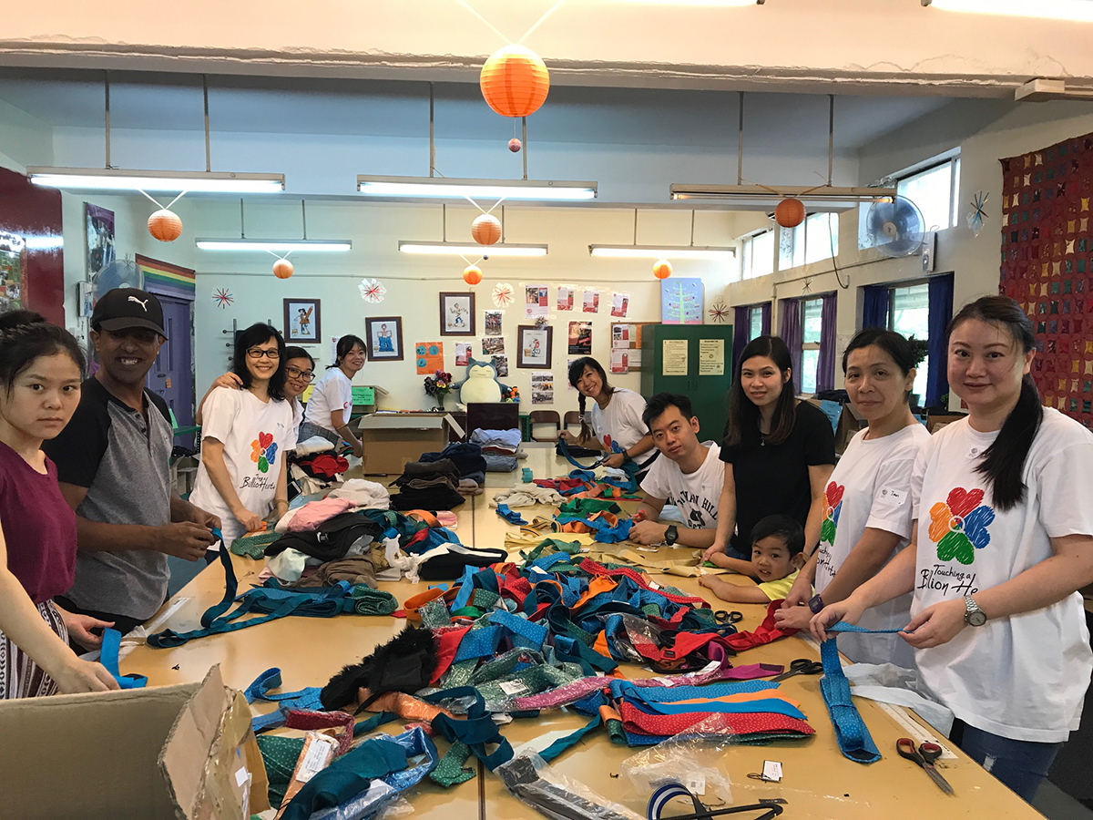 QI Hong Kong Staff Volunteer At Crossroads Foundation