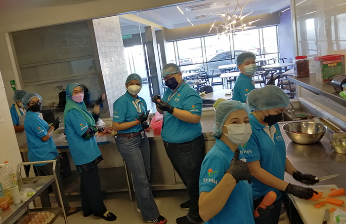 Quest International University Employees Prepare and Distribute Meals to the Disadvantaged