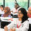 Girls listen attentively in a class.