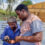 An NGO social worker teaching a rural entrepreneur new carpenter skills.