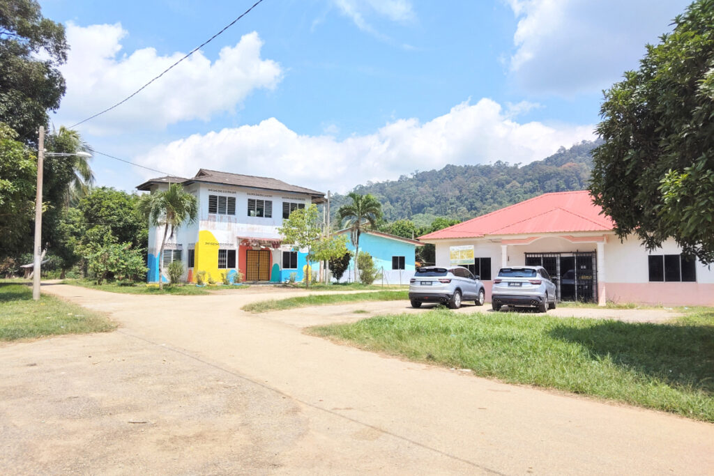Preschool, prayer, and community hall buildings in Kampung Bukit Panjang, Muar, Johor.